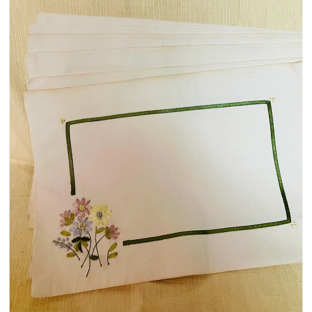 Vintage hand embroidered linen placemats